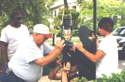 Lewis Turner and crew assemble memorial lamp